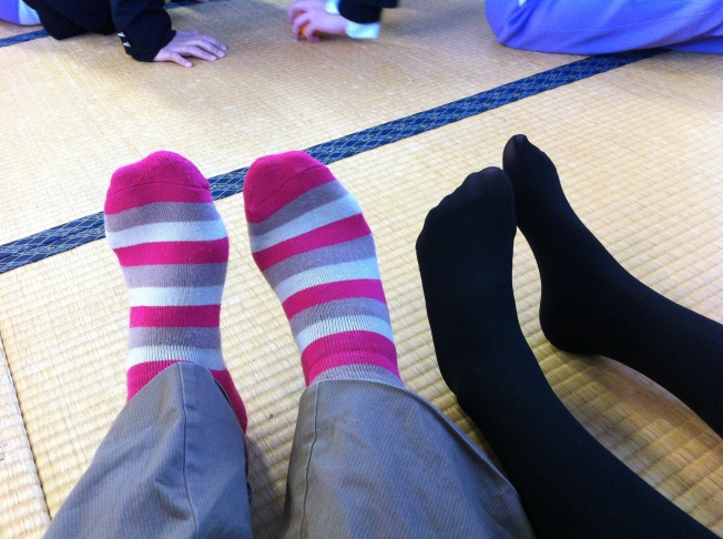I love this picture of my feet and our tiny English Club president's tiny feet!